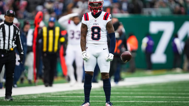 Stefon Diggs celebrates on the field during a Patriots game at MetLife Stadium.