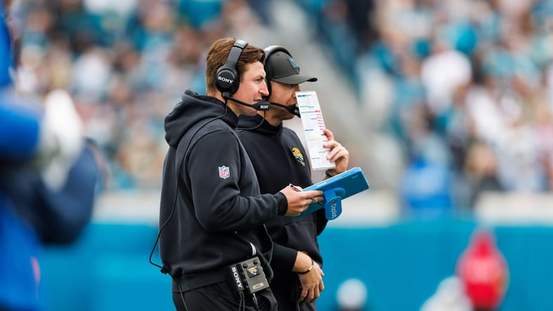 Grant Udinski and Liam Coen on the Jaguars sideline at EverBank Stadium.