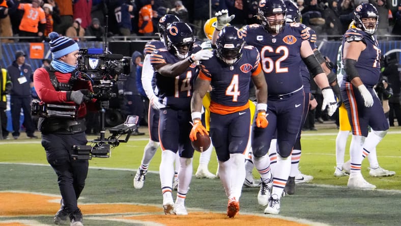 D’Andre Swift celebrates after scoring a touchdown at Soldier Field.