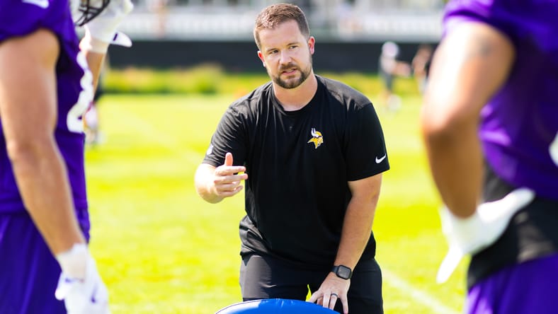 Vikings coach Ryan Cordell works with tight ends during 2025 training camp practice.. Minnesota Vikings coaching change offense