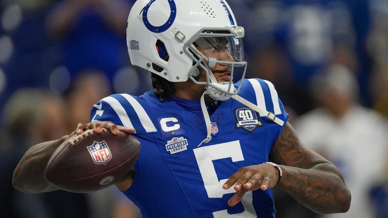 Anthony Richardson warms up on the field before a Colts game.