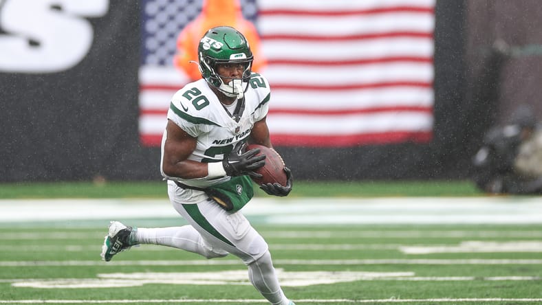 Breece Hall gaining yards after the catch