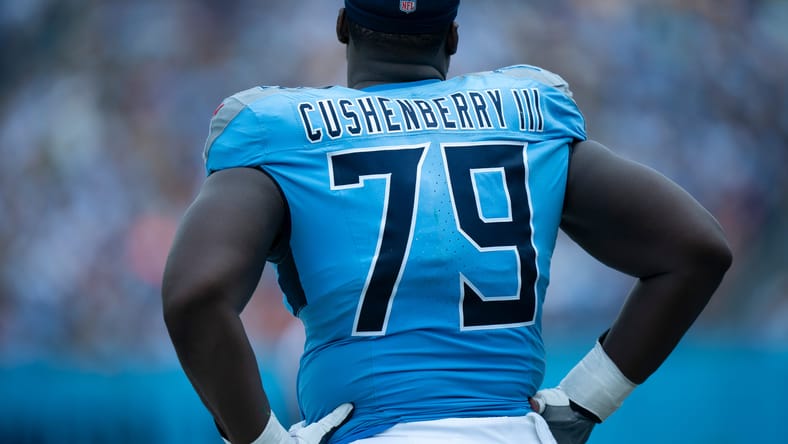 Lloyd Cushenberry III stands at the line of scrimmage during a Titans game at Nissan Stadium. Vikings center options 2026.