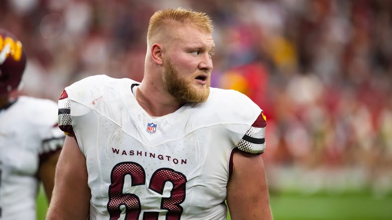 Tyler Biadasz lines up at center for Washington against the Cardinals at State Farm Stadium.