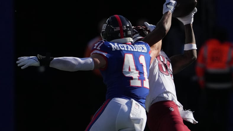 Noah Brown catches a pass in front of Micah McFadden during a game at MetLife Stadium. vikings free agent linebackers 2026.