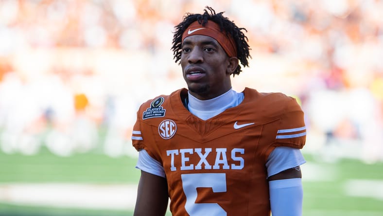 Malik Muhammad lines up on defense during a Texas playoff game against Clemson. Malik Muhammad Vikings draft.