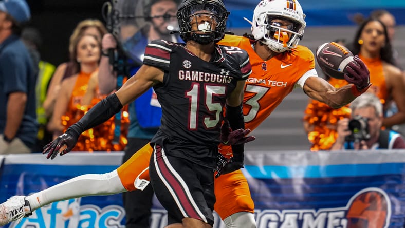 Donavon Greene attempts a one-handed catch against Brandon Cisse at Mercedes-Benz Stadium. Vikings ESPN mock draft.