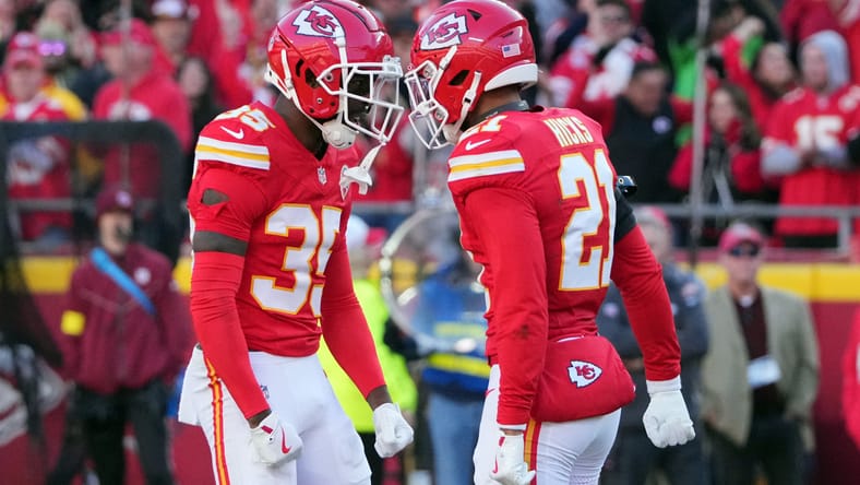 Jaylen Watson celebrates with Jaden Hicks during a game against the Colts at Arrowhead Stadium.
