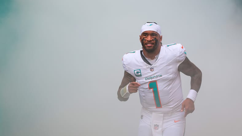 Tua Tagovailoa takes the field before a Dolphins game in Miami. Tua Tagovailoa Vikings.
