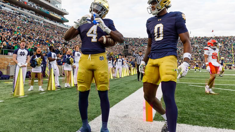 Notre Dame running back Jeremiyah Love celebrates after a touchdown at Notre Dame Stadium.