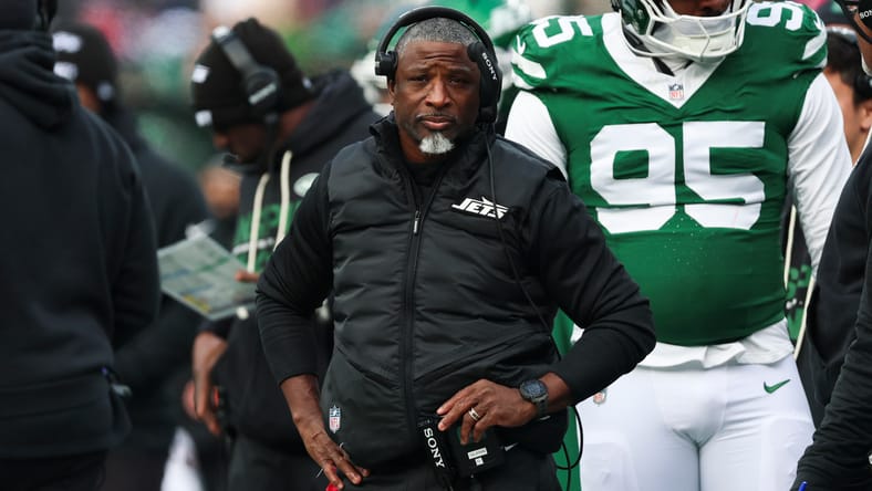 Aaron Glenn reacts on the sideline during a Jets game against the Patriots at MetLife Stadium.