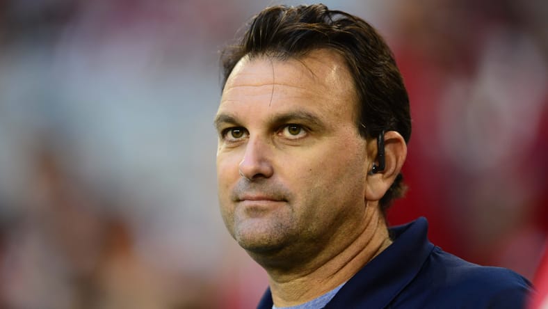 Drew Rosenhaus stands on the sideline before an NFL game in Arizona