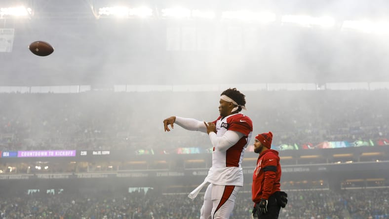 Kyler Murray warms up before a Cardinals game against the Seahawks at CenturyLink Field. Vikings quarterback battle 2026