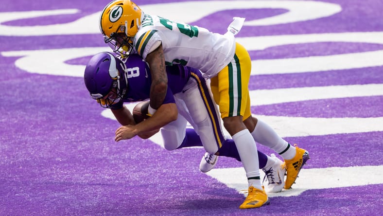 Jaire Alexander sacks Kirk Cousins for a safety at U.S. Bank Stadium. Kirk Cousins Packers