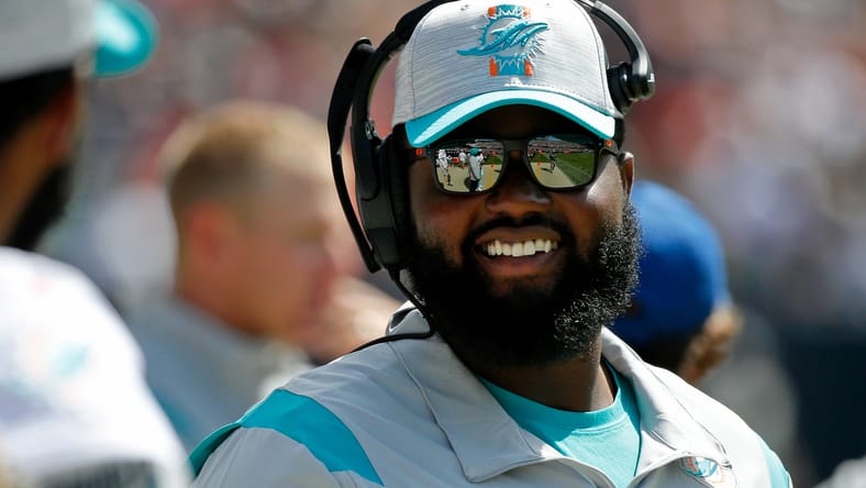 Gerald Alexander smiles on the sideline during Dolphins preseason game against the Chicago Bears. James Pierre Vikings