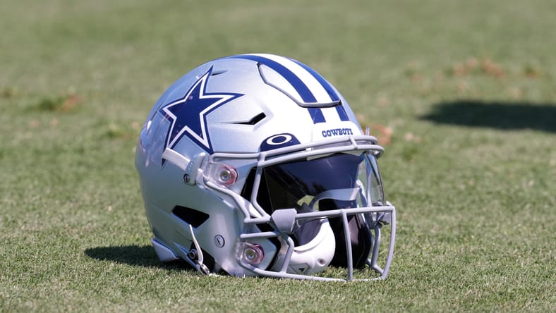 A Dallas Cowboys helmet on the field in 2022