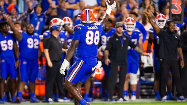Florida defensive lineman Caleb Banks recovering a fumble during a game at Ben Hill Griffin Stadium. Jordan Reid Vikings mock draft.