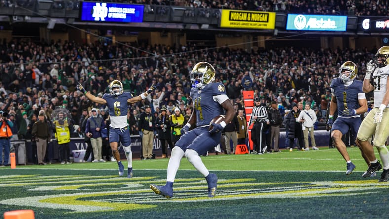 Notre Dame running back Jeremiyah Love scores a touchdown against Army during a first-half play at Yankee Stadium. Vikings draft pick