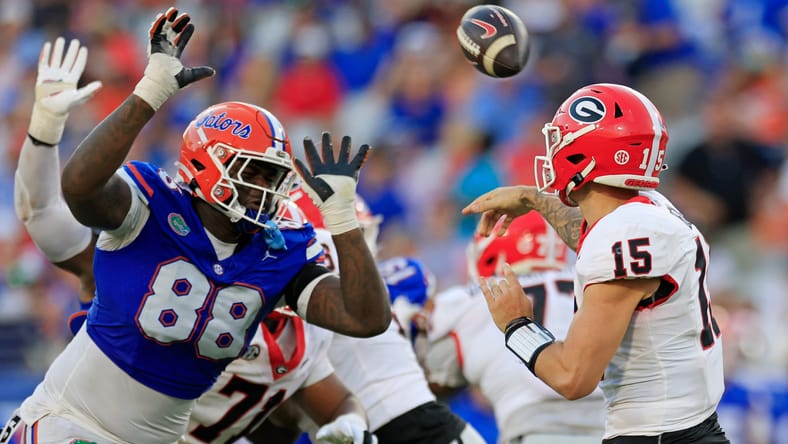 Caleb Banks pressures Carson Beck during Georgia vs. Florida game. Vikings DT