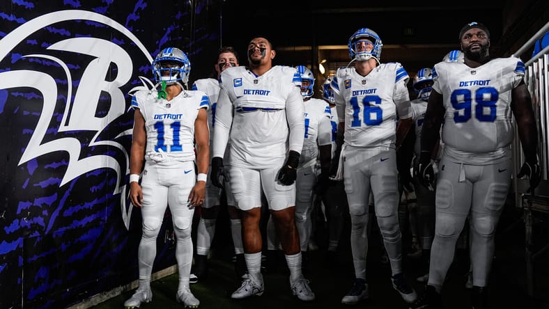 Lions players including D.J. Reader getting ready for a game in 2025