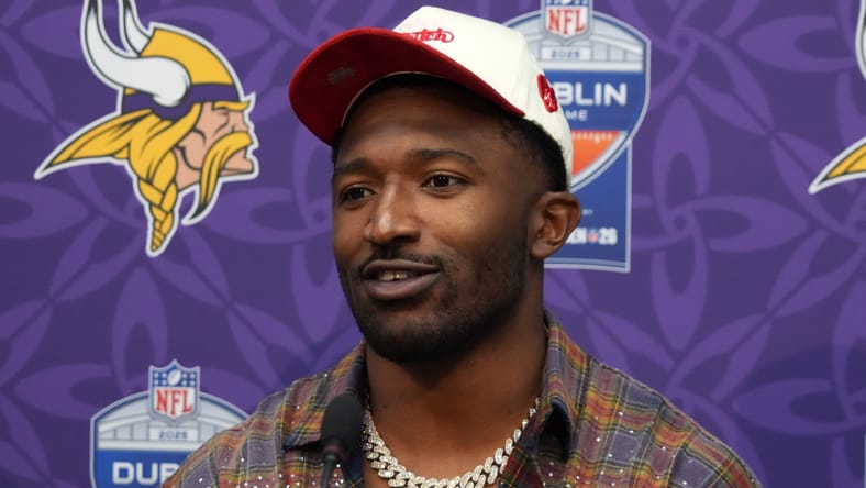 Jonathan Greenard speaks at a postgame press conference in Dublin. Sauce Gardner Vikings trade