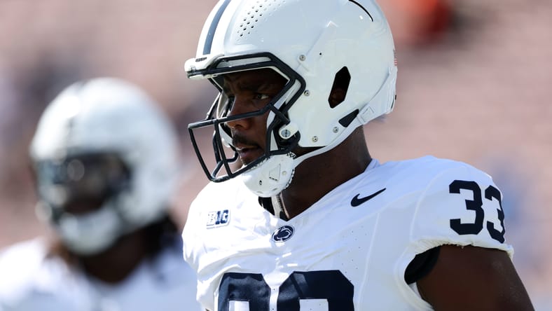 Dani Dennis-Sutton warms up on the field before a game against UCLA at the Rose Bowl. Dani Dennis-Sutton Vikings