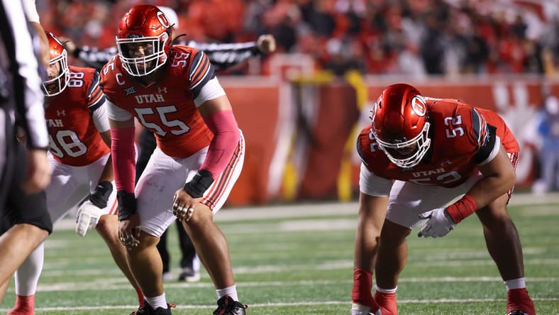 Spencer Fano and Michael Mokofisi wait for a play at Rice-Eccles Stadium against Arizona State. vikings draft spencer fano