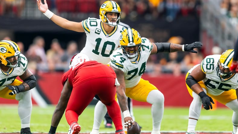 Jordan Love and Elgton Jenkins react during Packers vs. Cardinals game at State Farm Stadium. Elgton Jenkins Vikings