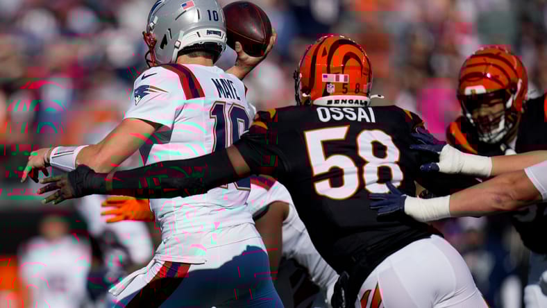 Joseph Ossai pressures Drake Maye during a Cincinnati Bengals game against the New England Patriots at Paycor Stadium. Nahshon Wright Jets