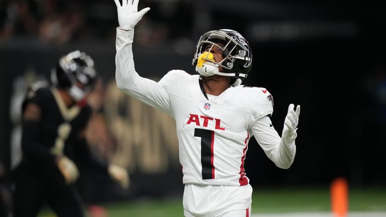 Darnell Mooney celebrates after scoring a touchdown for the Atlanta Falcons against the New Orleans Saints.
