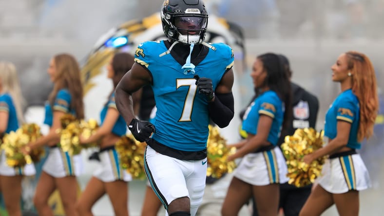 Brian Thomas Jr. runs onto the field during pregame introductions at EverBank Stadium. Vikings trades.