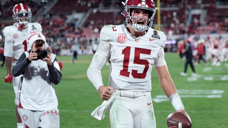 Ty Simpson celebrating during a College Football Playoff game against Oklahoma. Ty Simpson Vikings.