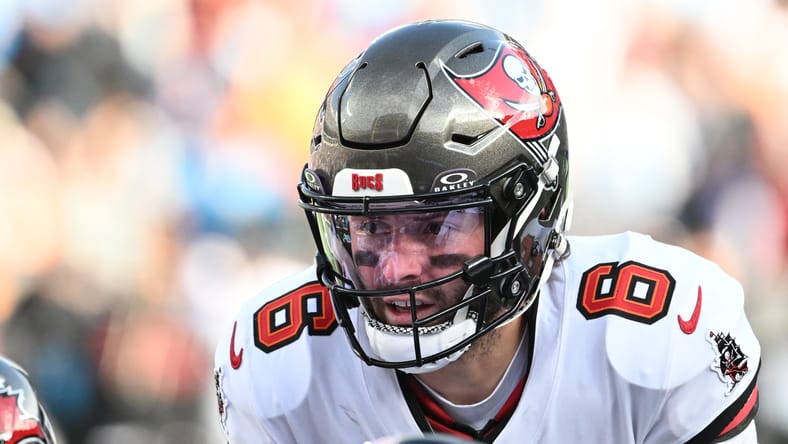 Baker Mayfield lines up at the line of scrimmage during a game against the Panthers. Baker Mayfield Vikings