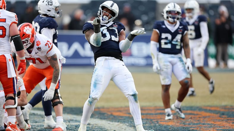 Dani Dennis-Sutton celebrates after a sack against Clemson in the Pinstripe Bowl. Dani Dennis-Sutton Vikings