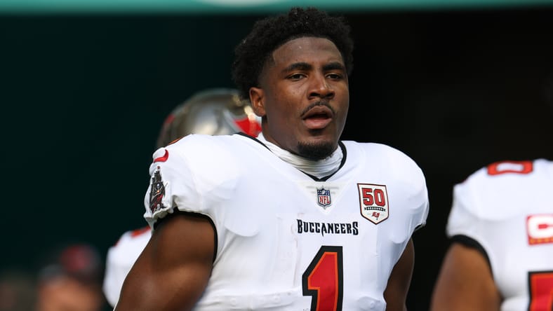 Rachaad White runs onto the field during Tampa Bay Buccaneers player introductions before a game against the Miami Dolphins. Vikings running back draft.