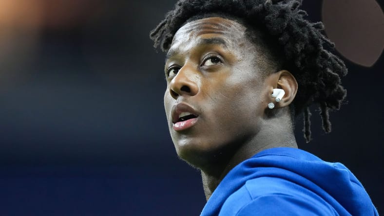 Sauce Gardner warms up before a game at Lucas Oil Stadium. Sauce Gardner Vikings trade