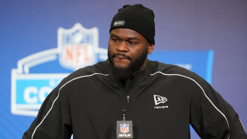 Caleb Banks speaking to reporters during the NFL Scouting Combine in Indianapolis.