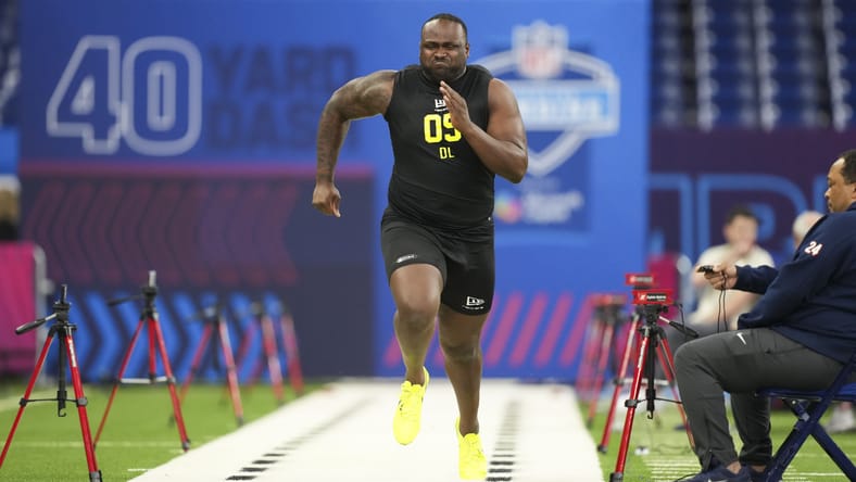 DeMonte Capehart runs the 40-yard dash at the NFL Scouting Combine in Indianapolis.