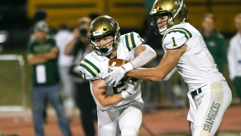 Dillon Thieneman runs during a high school football game against Carmel. dillon thieneman vikings