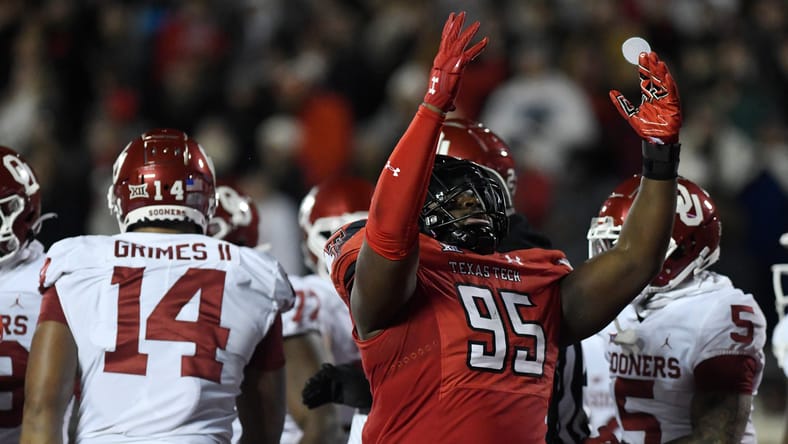 Jaylon Hutchings celebrating touchdown during Texas Tech vs Oklahoma game. Vikings cut Jaylon Hutchings.