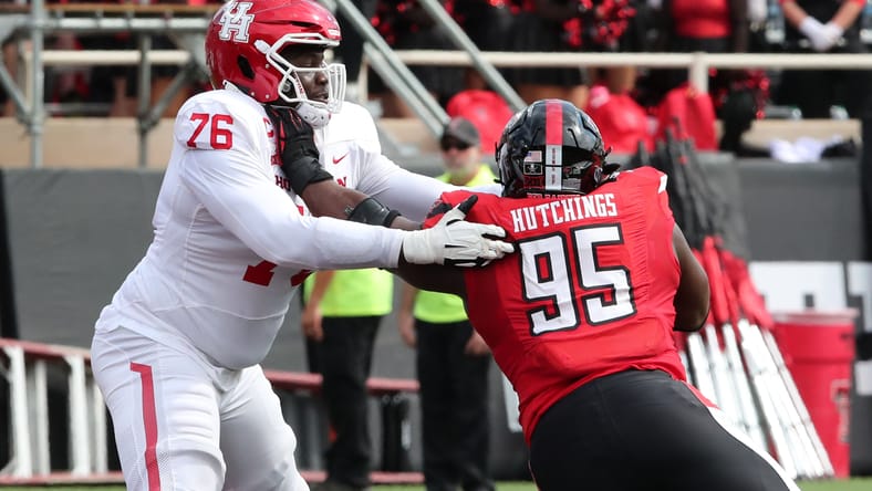 Patrick Paul blocking Jaylon Hutchings during Houston vs Texas Tech game. Vikings cut Jaylon Hutchings.