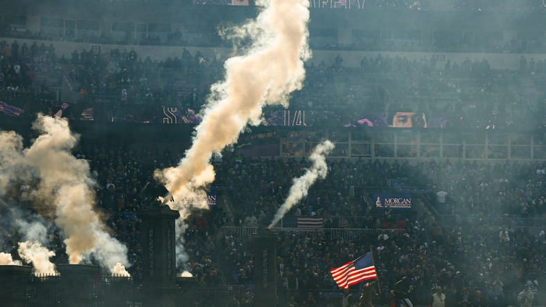 Ravens EDGE Jadeveon Clowney runs onto the field in 2023