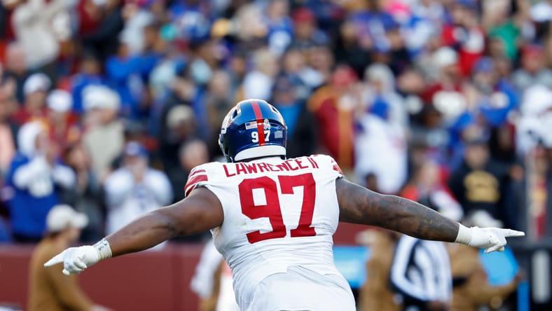 Dexter Lawrence celebrates after a defensive play against the Commanders. Dexter Lawrence trade
