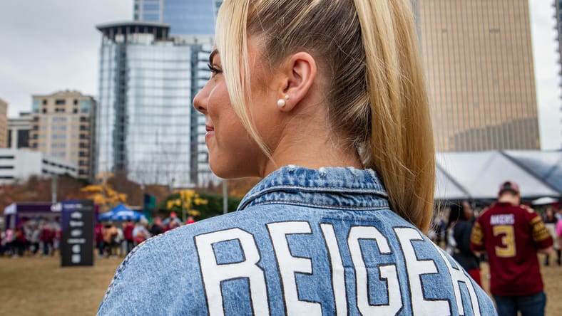 India Reed wears a custom jacket supporting Mason Reiger at Fan Fest. Mason Reiger Vikings.