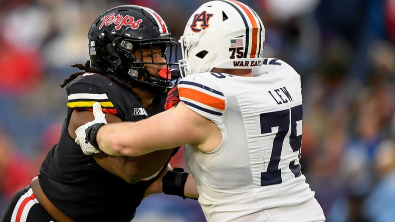 Christian Teague rushes against Auburn at Nissan Stadium. Vikings Pick No. 49