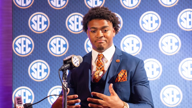 Keldric Faulk speaking to media during an offseason event. Vikings draft edge rusher.