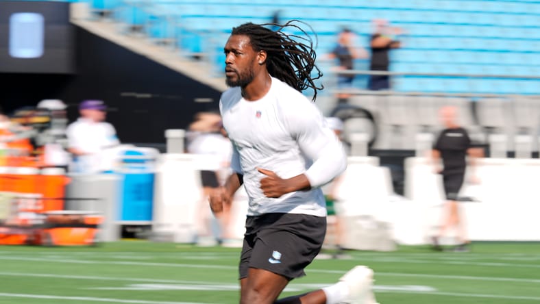 Jadeveon Clowney warms up on the field before a Panthers preseason game against the Jets. Jadeveon Clowney Vikings