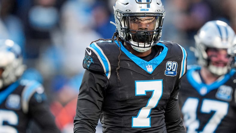 Jadeveon Clowney on field during Panthers vs Cardinals game. Vikings free agents.