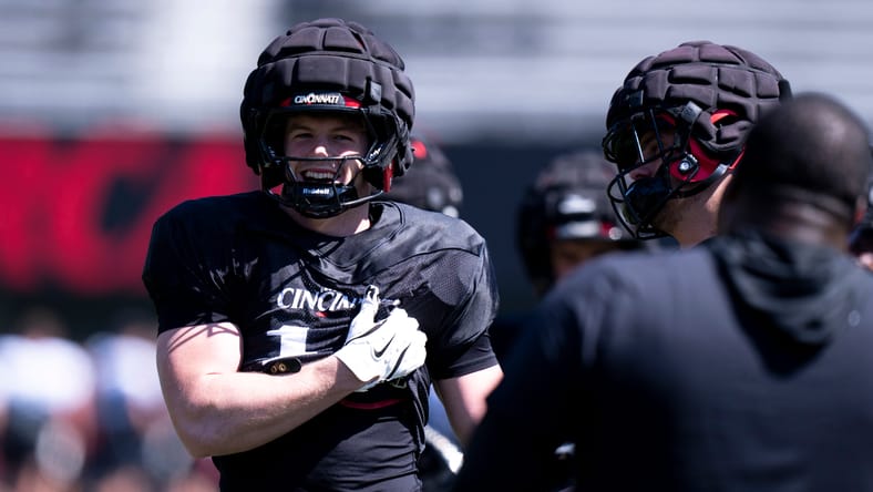 Jake Golday smiling during Cincinnati spring football practice at Nippert Stadium. Jake Golday.