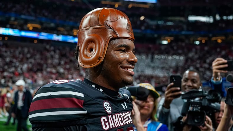 LaNorris Sellers wearing the Old Leather Helmet after a South Carolina victory. LaNorris Sellers Vikings